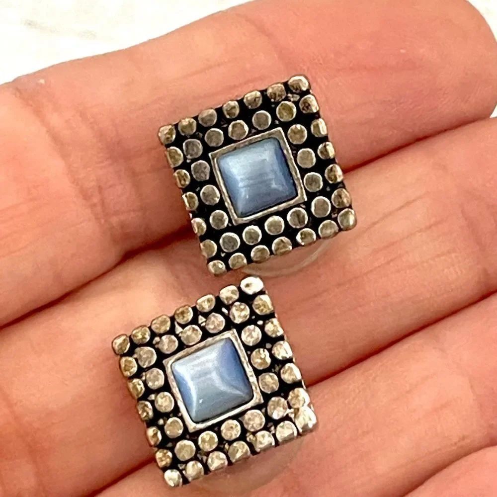Silver tone square blue center post earrings